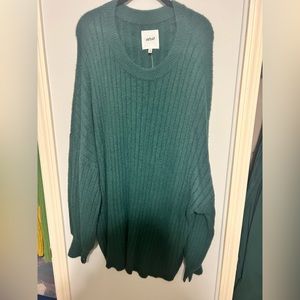 Dark green thick knit sweater.